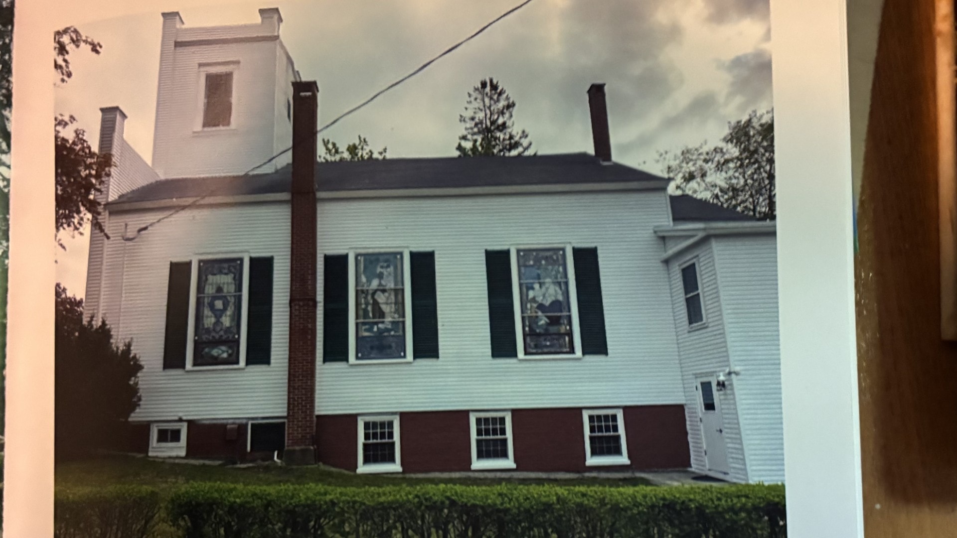 Church side view after restoration — period trim and details fully restored